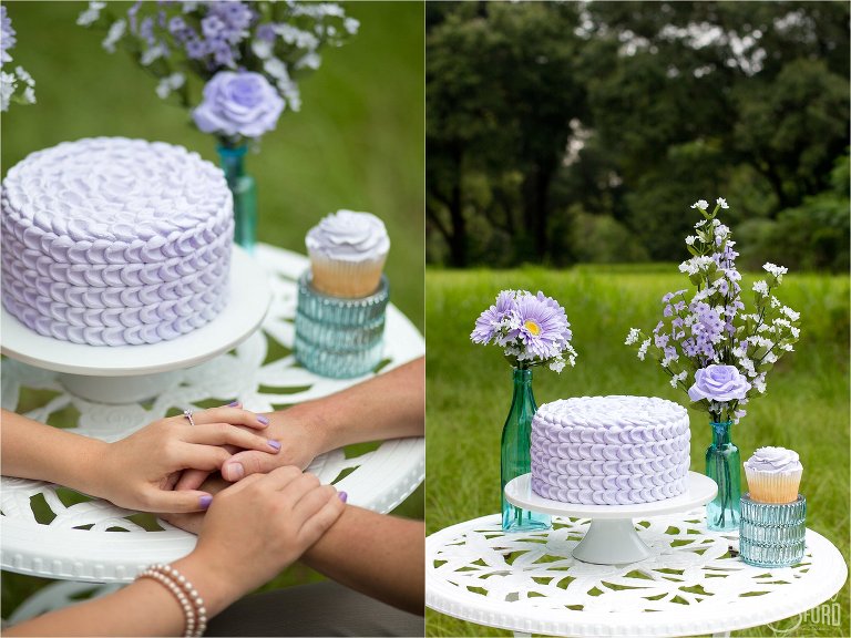 Cupcake themed engagement session with pastel colored cake and flowers with couple holding hands