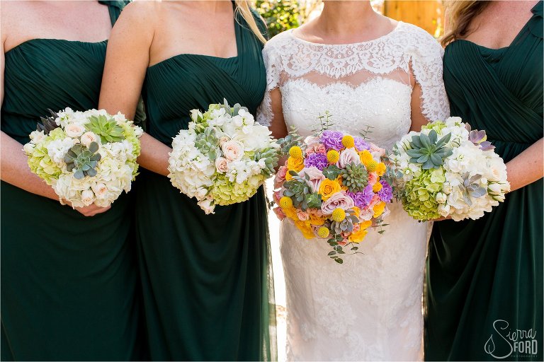 Gorgeous bouquets being held by bride and bridesmaids