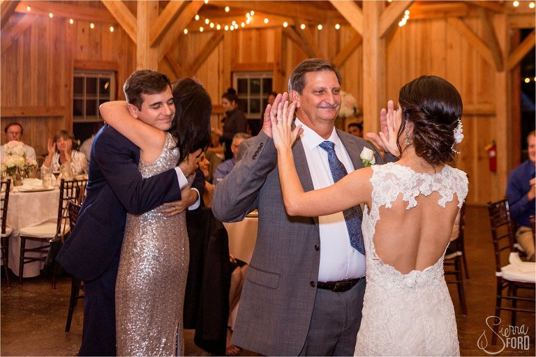 Bride and groom share parent dances 