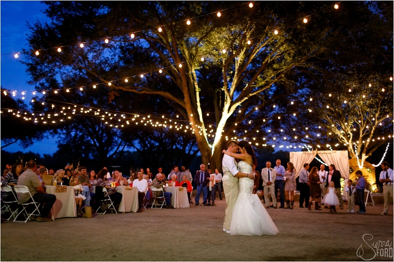 first dance at wedding with market lights