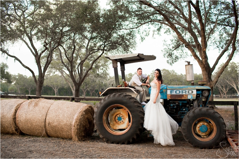 orlando rustic wedding bride and groom on tractor