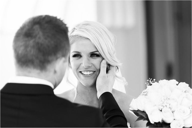 Groom touching his Bride's face