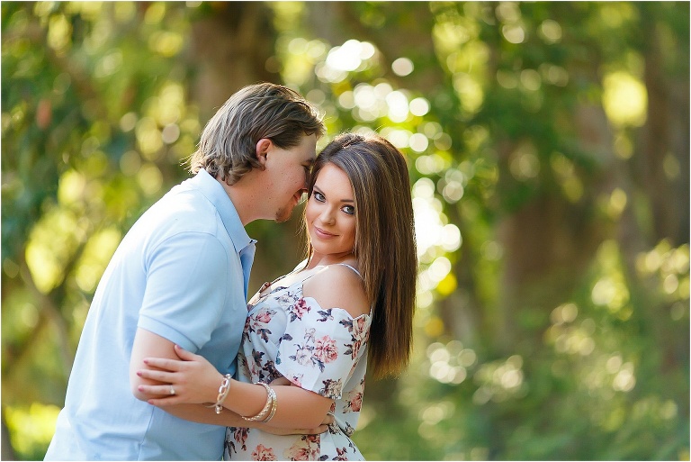 Nuzzling her cheek among the trees