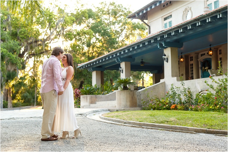 Full body shot of couple in Sydonie Mansion's circular driveway