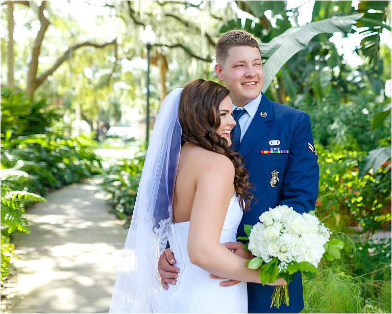 Bride & groom grinning from ear to ear now that they're officially married