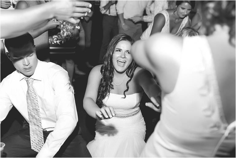 The bride and her brother getting down on the dance floor