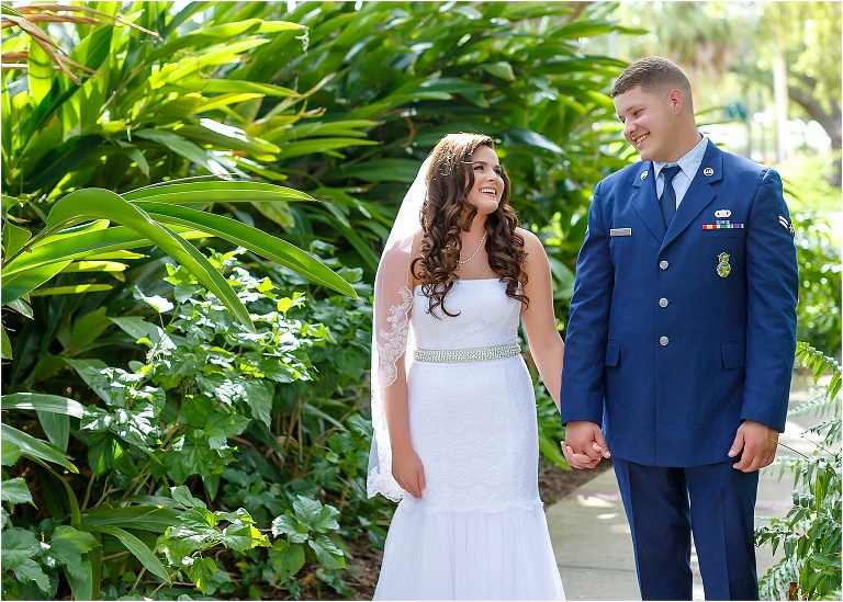 Bride & groom taking a relaxing stroll through Wooten Park
