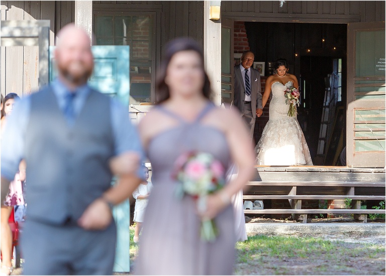 the bride and her father prepare wedding ceremony at Doe Lake