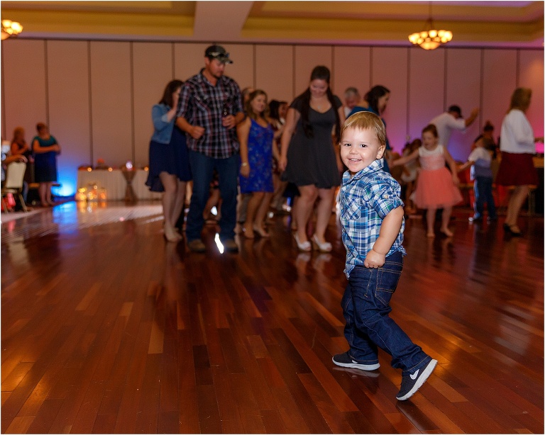 one of the youngest guests takes over the dance floor