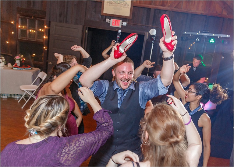 The groom dances the night away with his friends and family