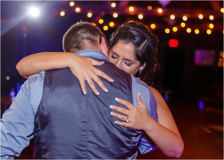Bride and groom share a quiet moment at the end of the night