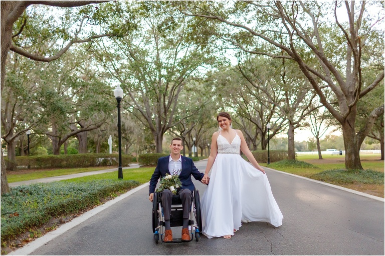 bride and groom in wheelchair at Cypress Grove Estate wedding
