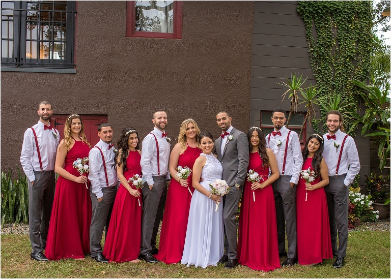 the couple and their beautiful wedding party are all smiles