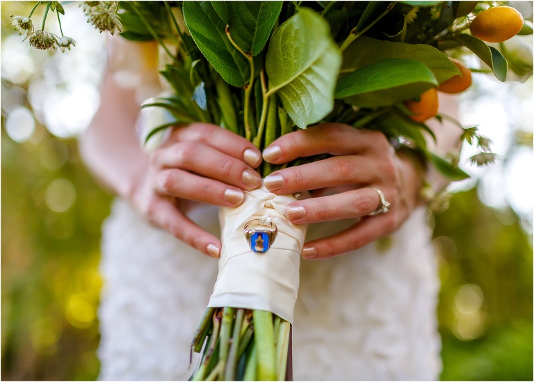 the bride tied her late grandfather's ring to her bouquet