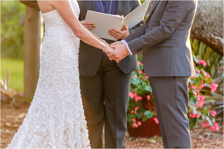close up of the couple's hands during their vows