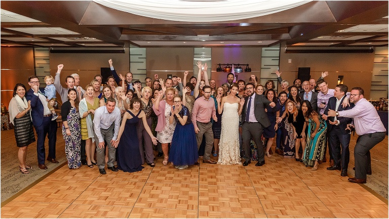 hilarious group photo of the couple's loving family and friends