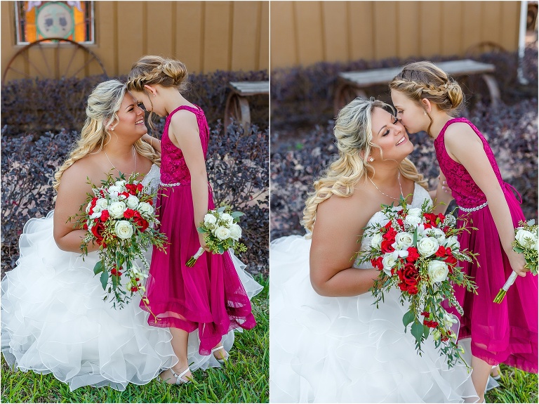 the bride & her daughter share a quiet moment and a kiss on the cheek