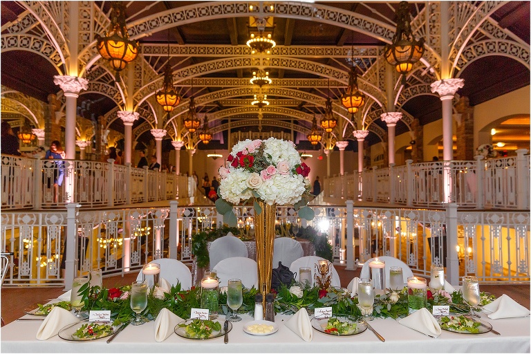 gorgeous Atmosphere Floral centerpiece at the head table with salads from John Michael Catering