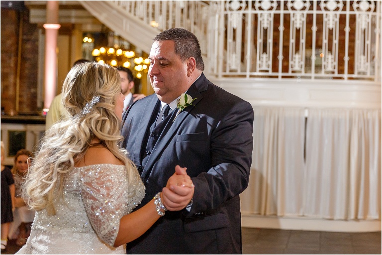 the bride shares an emotional dance with her father at the Orchid Garden at Church Street Station reception