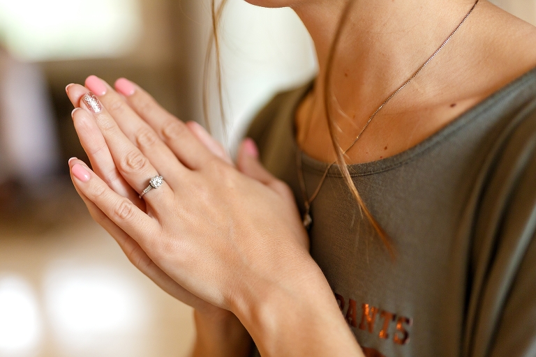 closeup of the bride's gorgeous vintage engagement ring as she prepares for her Harmony Gardens wedding ceremony