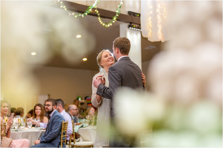 the groom shares a dance with his mother at their Bakers Ranch wedding reception