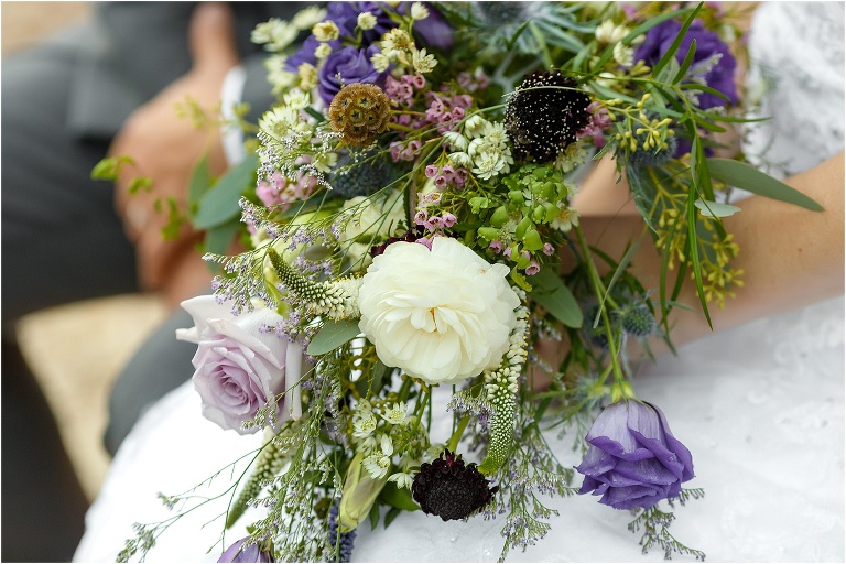 purple and green cascading bridal bouquet designed by Bliss Floral Design