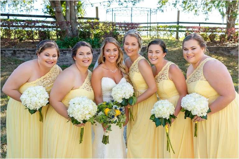 the bride and her bridesmaids are all smiles before their Cottom Farm wedding