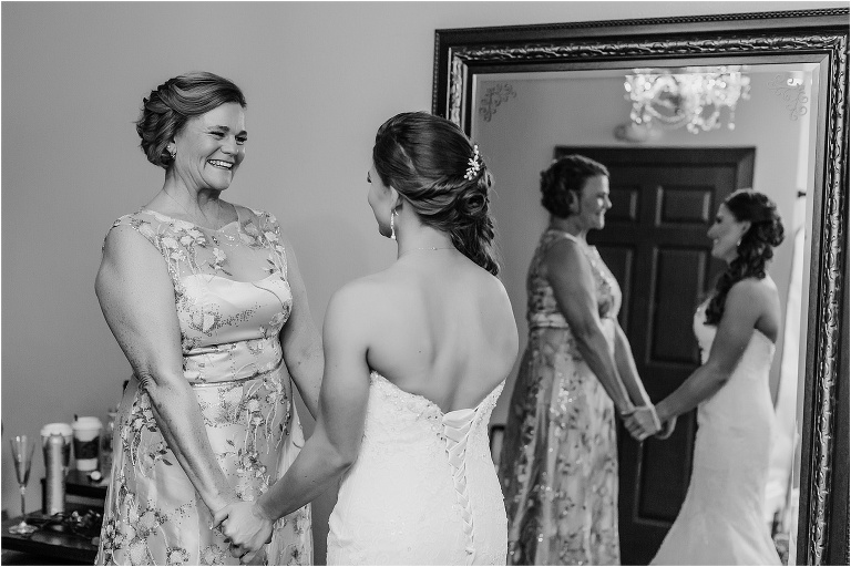 the bride takes a moment with her mother before her Bakers Ranch wedding