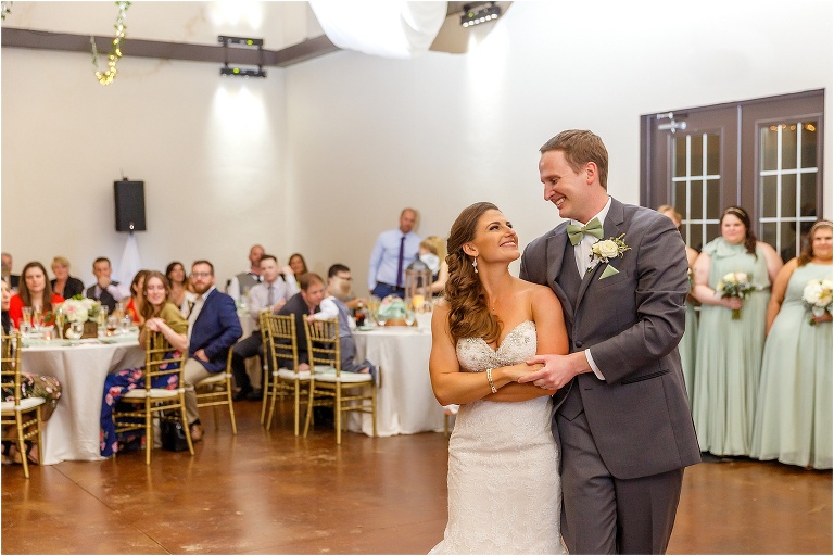 the bride and groom perform an exceptional choreographed first dance