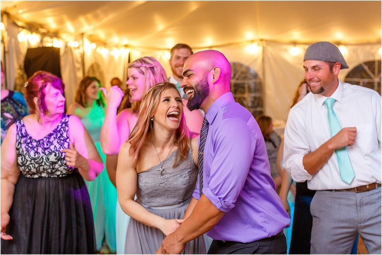 the guests crack up during the Cupid Shuffle at the Bellemoor Plantation wedding reception