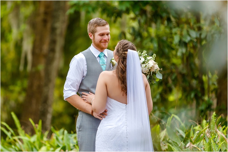 the groom cries as he sees his bride for the first time before their Bellemoor Plantation wedding