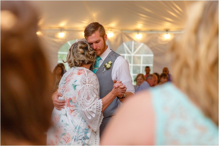 the groom shares an emotional dance with his mother during his Bellemoor Plantation wedding reception