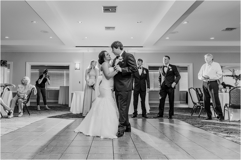 the bride and groom share their first dance as husband and wife at their Crystal River wedding reception