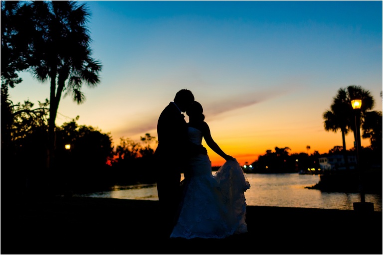 sunset silhouette at their crystal river wedding