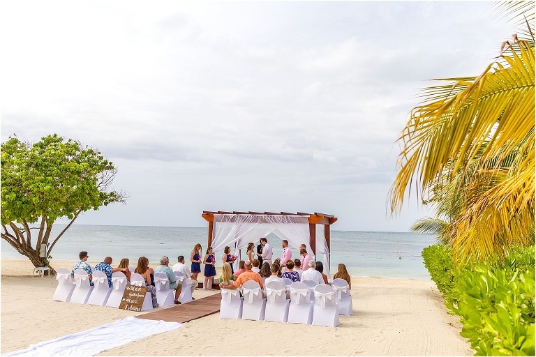 their Montego Bay wedding ceremony took place on the beach right by the water