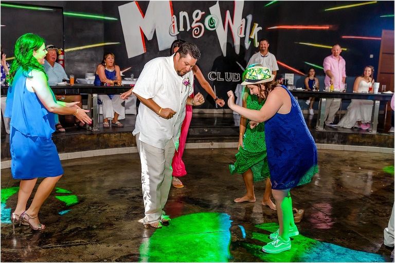 the bride's family shows off their best moves on the dance floor at their Montego Bay wedding