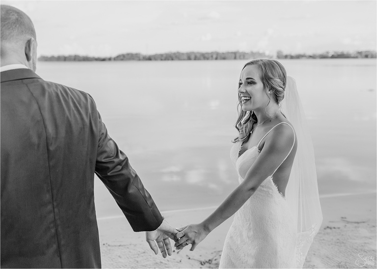 couple along water at Paradise cove wedding