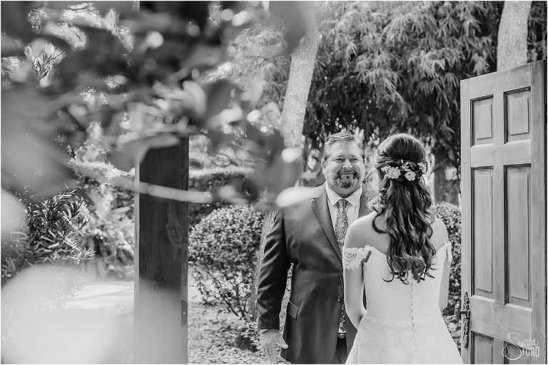 father of the bride sees his daughter for first time before her Club Lake Plantation wedding