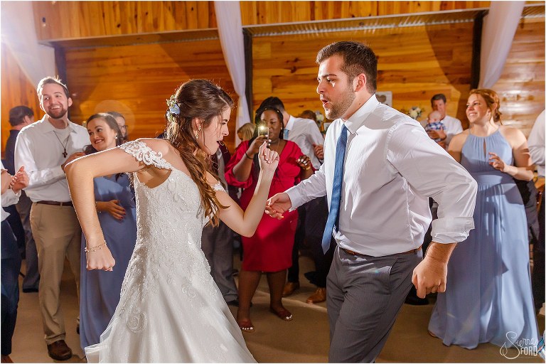 bride & her twin brother break it down at Club Lake Plantation wedding reception