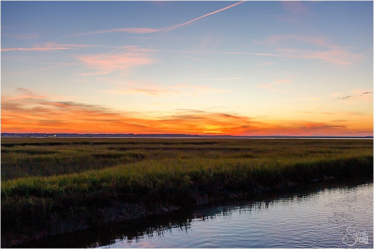 orange and blue sunset over the marsh at Amelia Island wedding