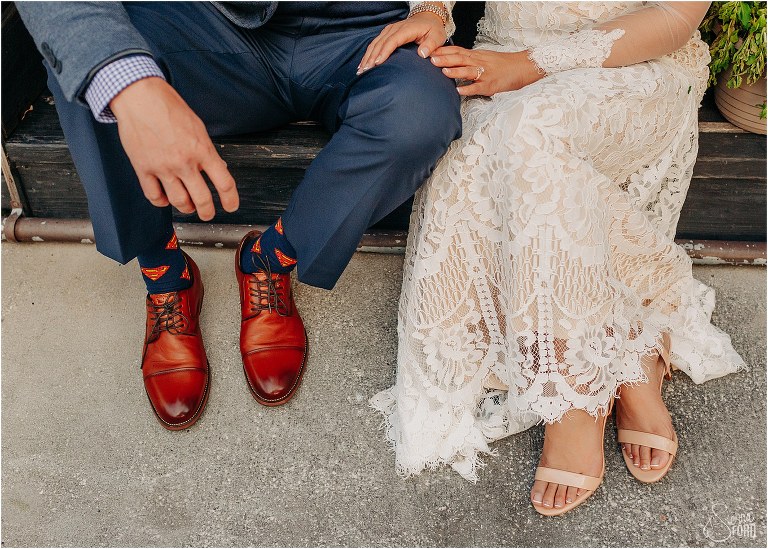 the bride & groom's feet as they sit on Goblin Market stoop at Florida elopement