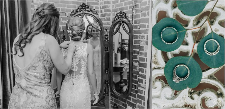 on left, mother of the bride buttons bride's Rachel Allan wedding gown, on right, rings lay on leaves before Town Manor wedding