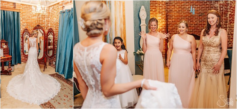 on left, bride stands before large mirror before Town Manor wedding, on right, bridesmaids see bride in dress for first time