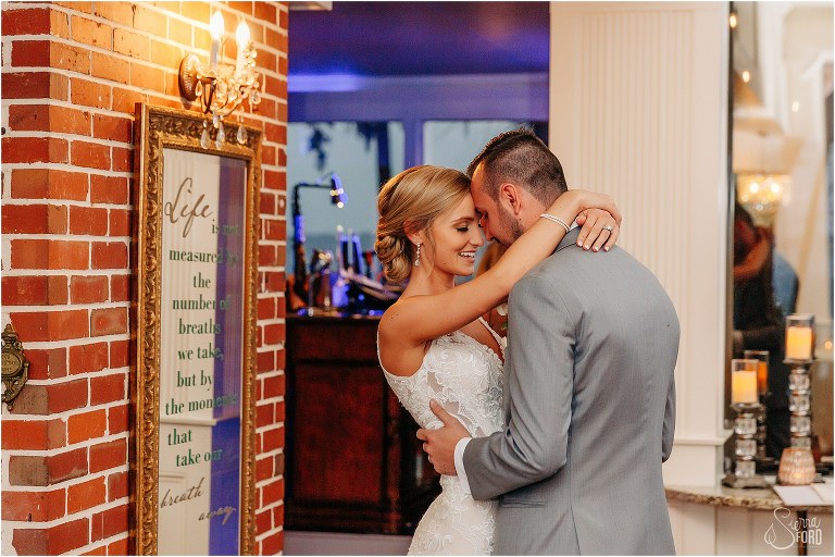 bride & groom share first dance as husband & wife at Town Manor wedding reception
