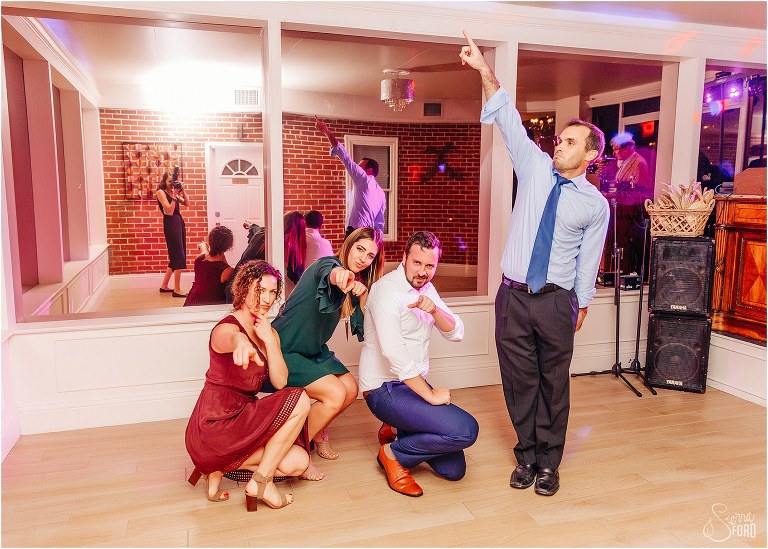 guests pose on the dance floor at Town Manor wedding reception