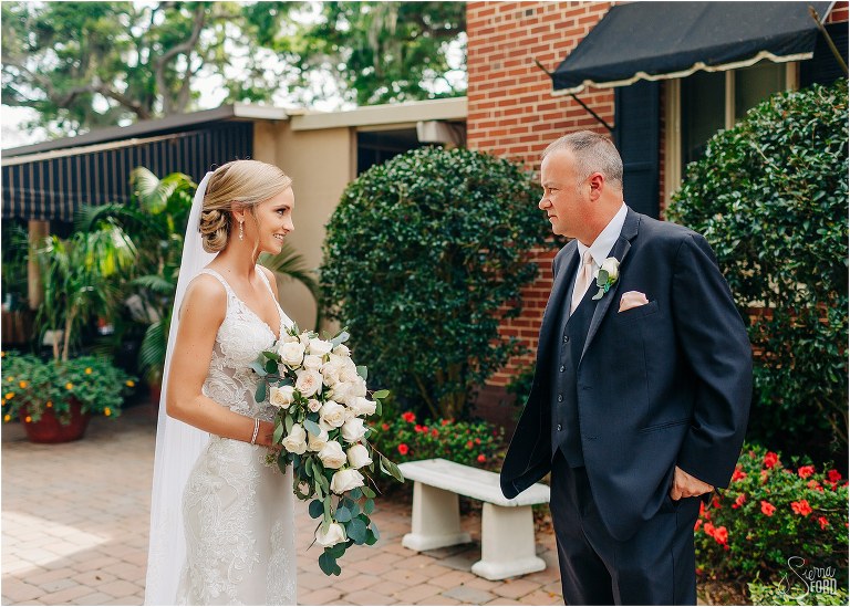 father of the bride sees his daughter for the first time before Town Manor wedding