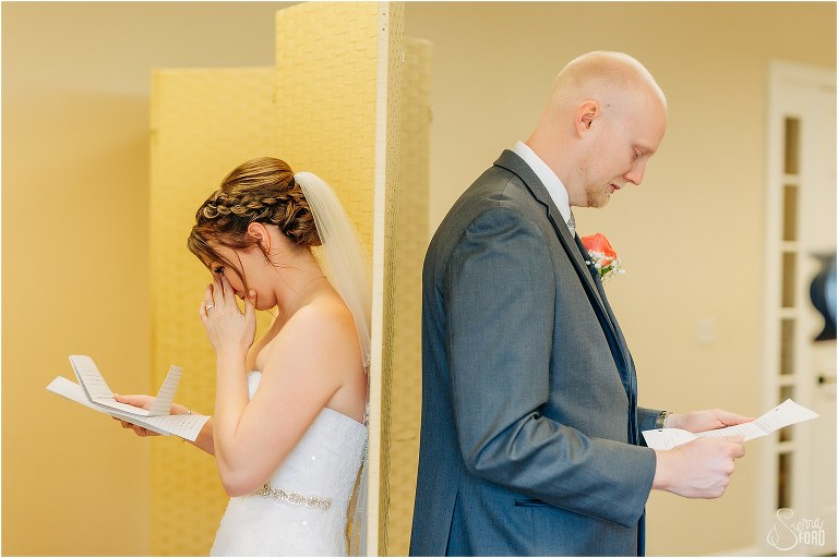 bride & groom get emotional as they read letters from each other before River House wedding