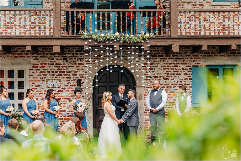 a peek at their intimate Winter Park wedding through the greenery