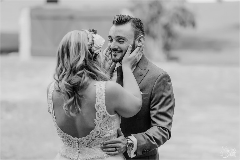 bride and groom lock eyes upon seeing each other for the first time before Winter Park wedding ceremony
