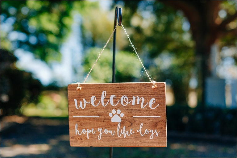 wedding dog sign at rustic wedding
